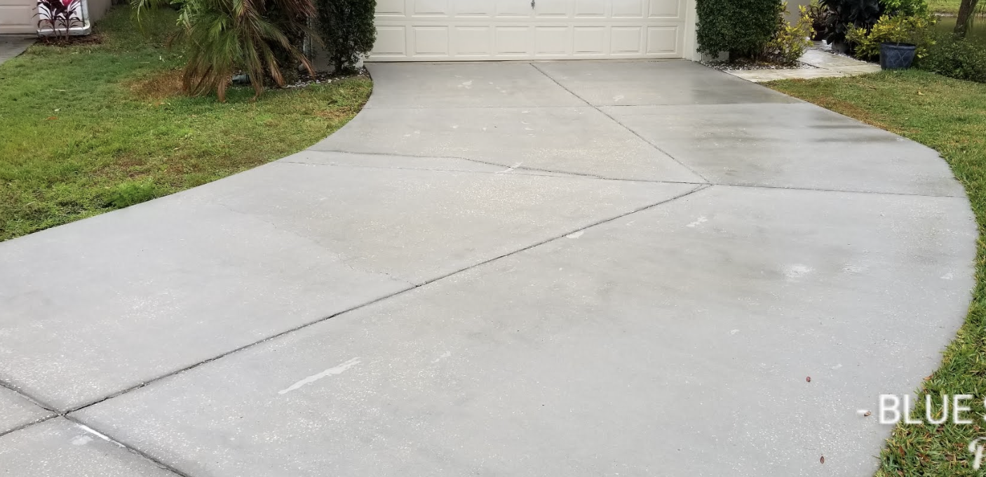 Before and after Driveway and Concrete Cleaning